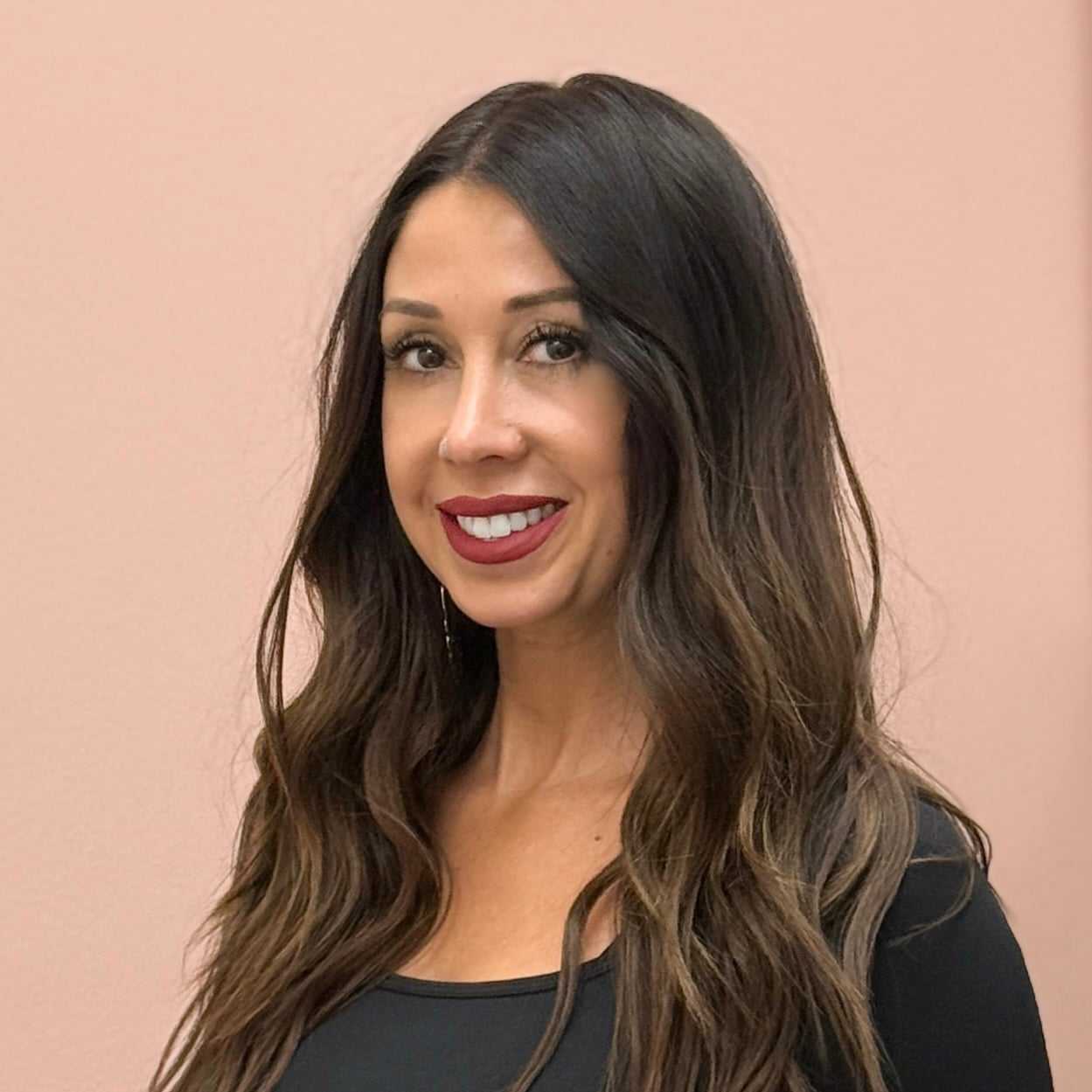 Portrait of Samantha, a professional stylist at Salon Blissful Med Spa, showcasing their expertise and style.