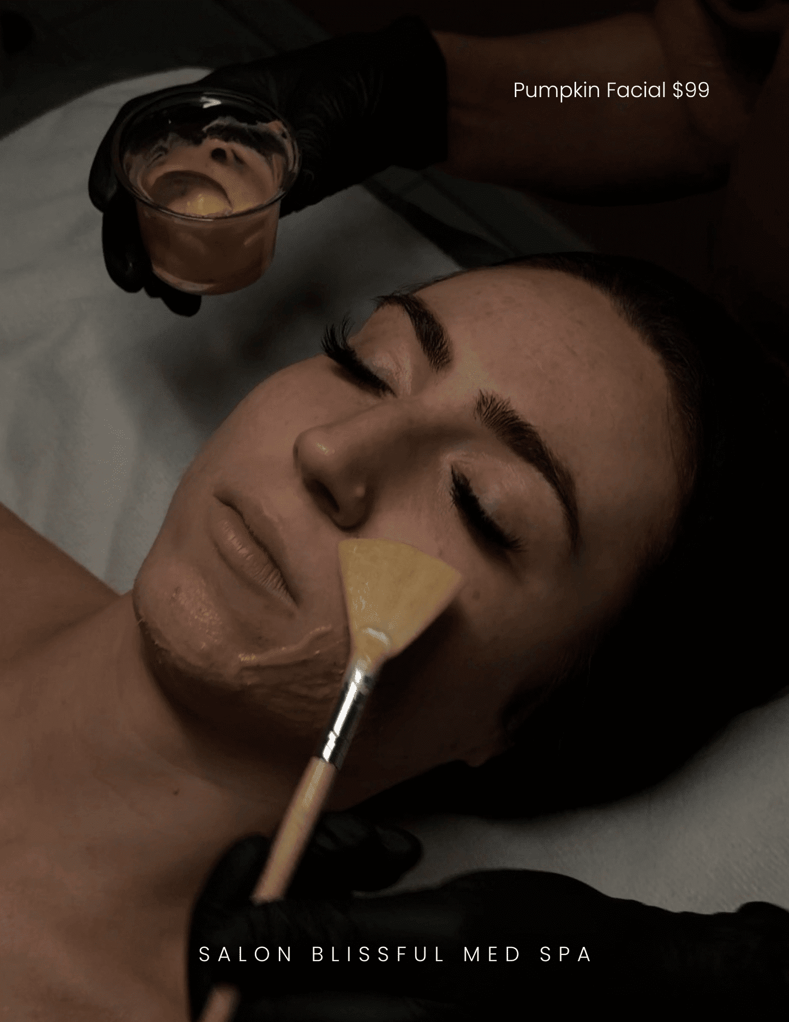 Woman receiving a pumpkin facial at Blissful Med Spa. Price is $99.