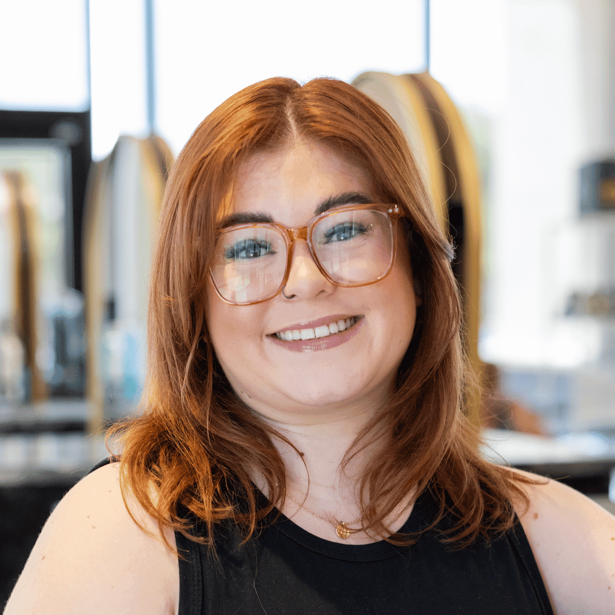 Portrait of Georgia, a professional stylist at Salon Blissful Med Spa, showcasing their expertise and style.