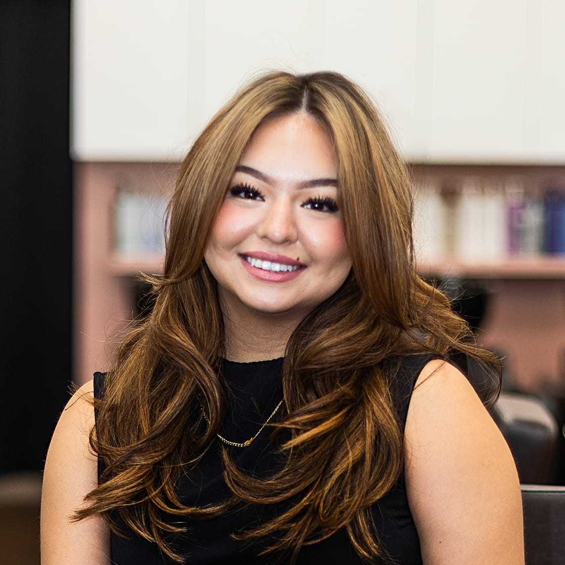 Portrait of Arianna, a professional stylist at Salon Blissful Med Spa, showcasing their expertise and style.