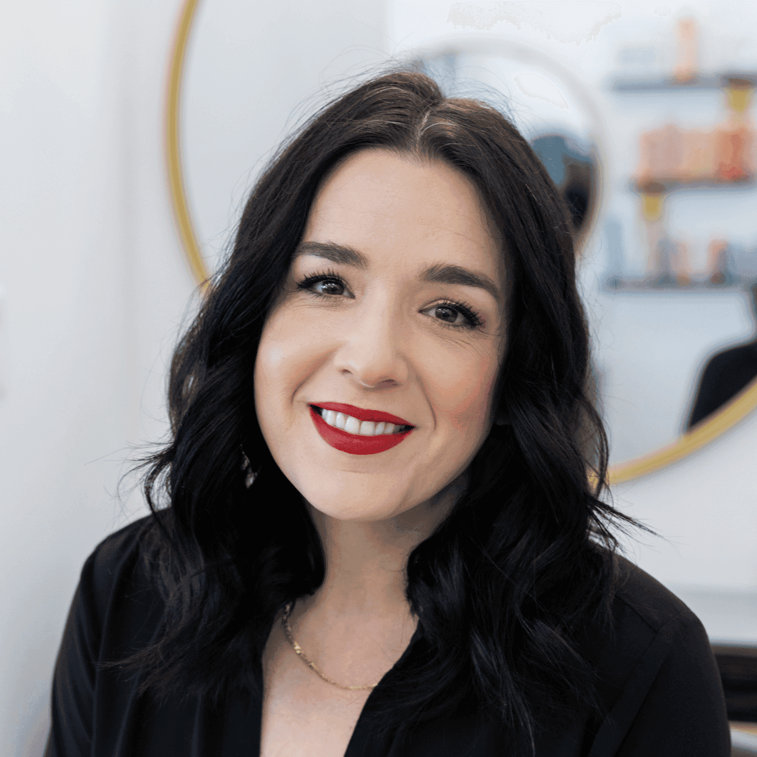 Portrait of Janna, a professional stylist at Salon Blissful Med Spa, showcasing their expertise and style.