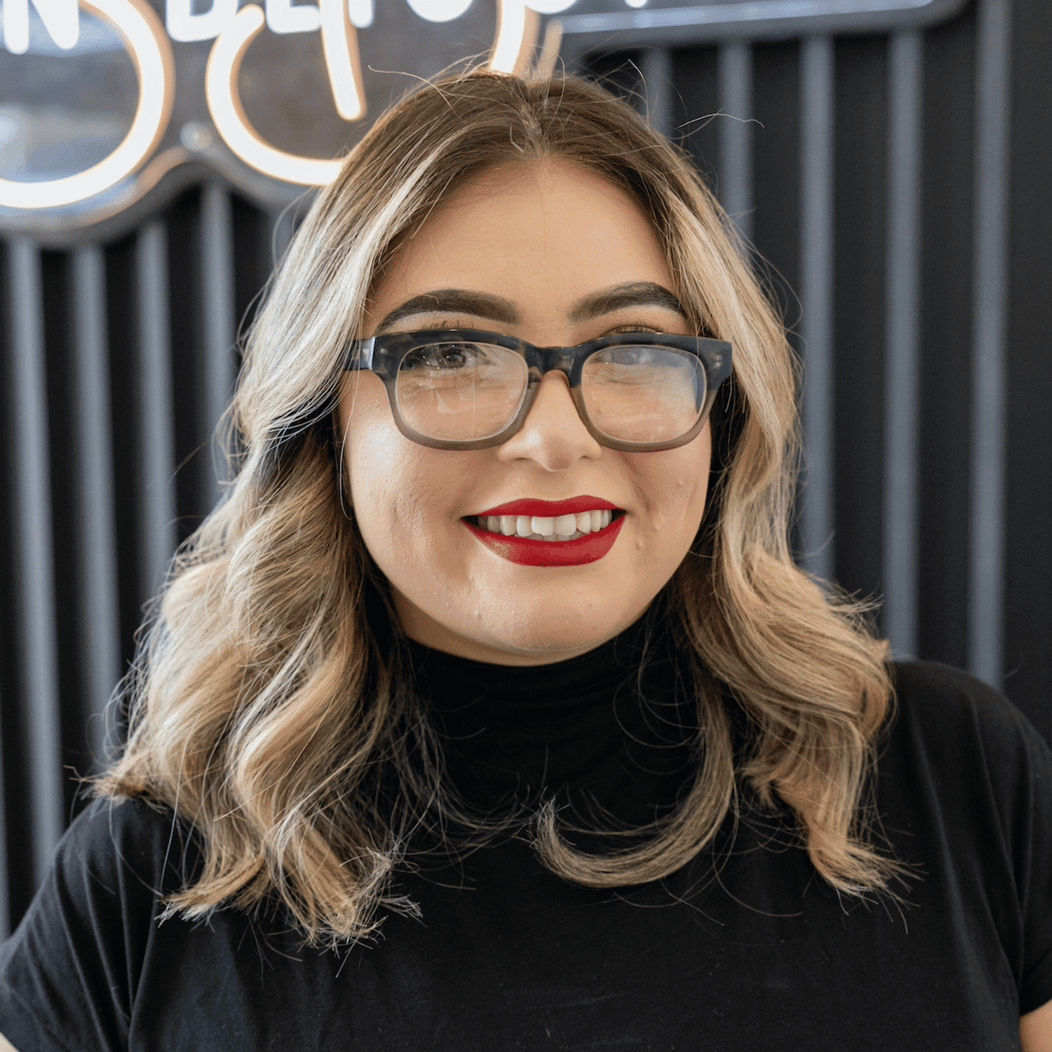 Portrait of Stacy, a professional stylist at Salon Blissful Med Spa, showcasing their expertise and style.