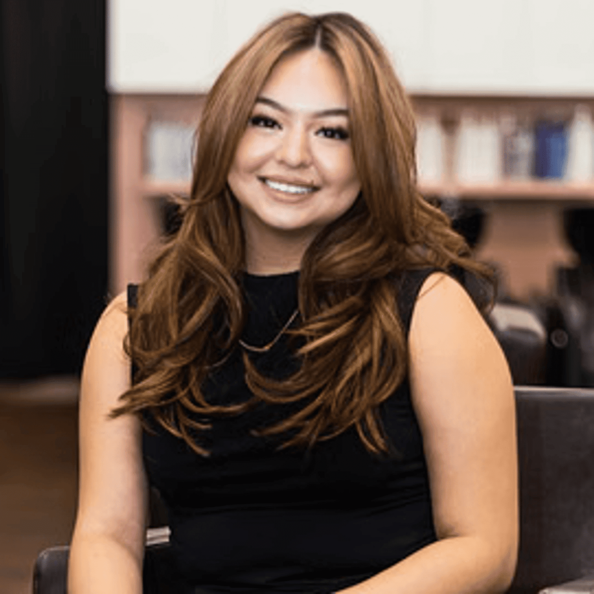 Portrait of Arianna, a professional stylist at Salon Blissful Med Spa, showcasing their expertise and style.