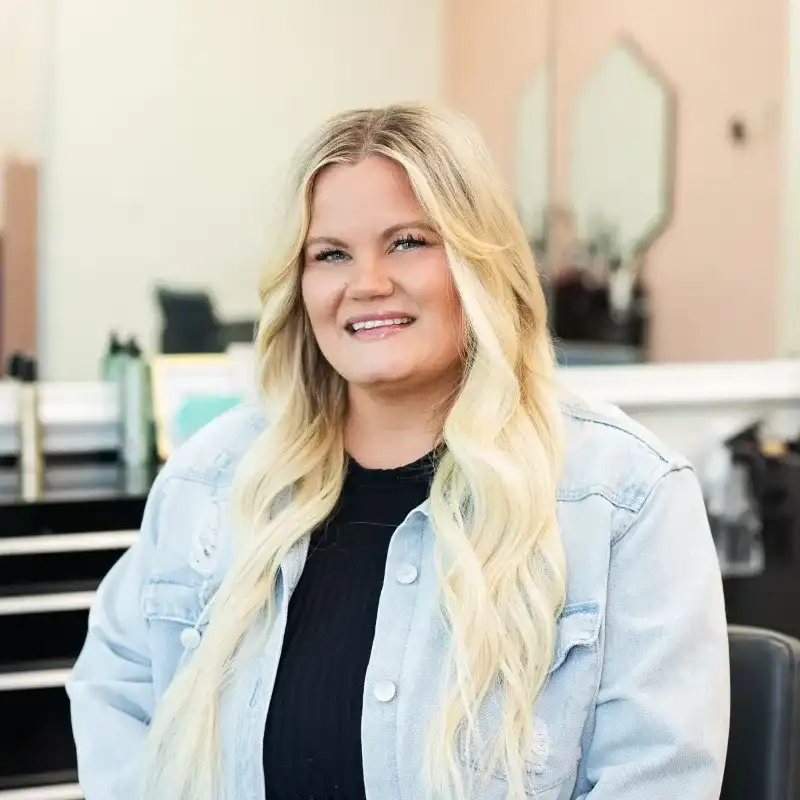 Portrait of Amber, a professional stylist at Salon Blissful Med Spa, showcasing their expertise and style.