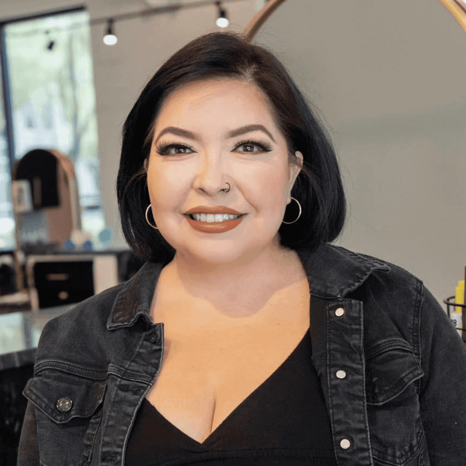 Portrait of Monica, a professional stylist at Salon Blissful Med Spa, showcasing their expertise and style.