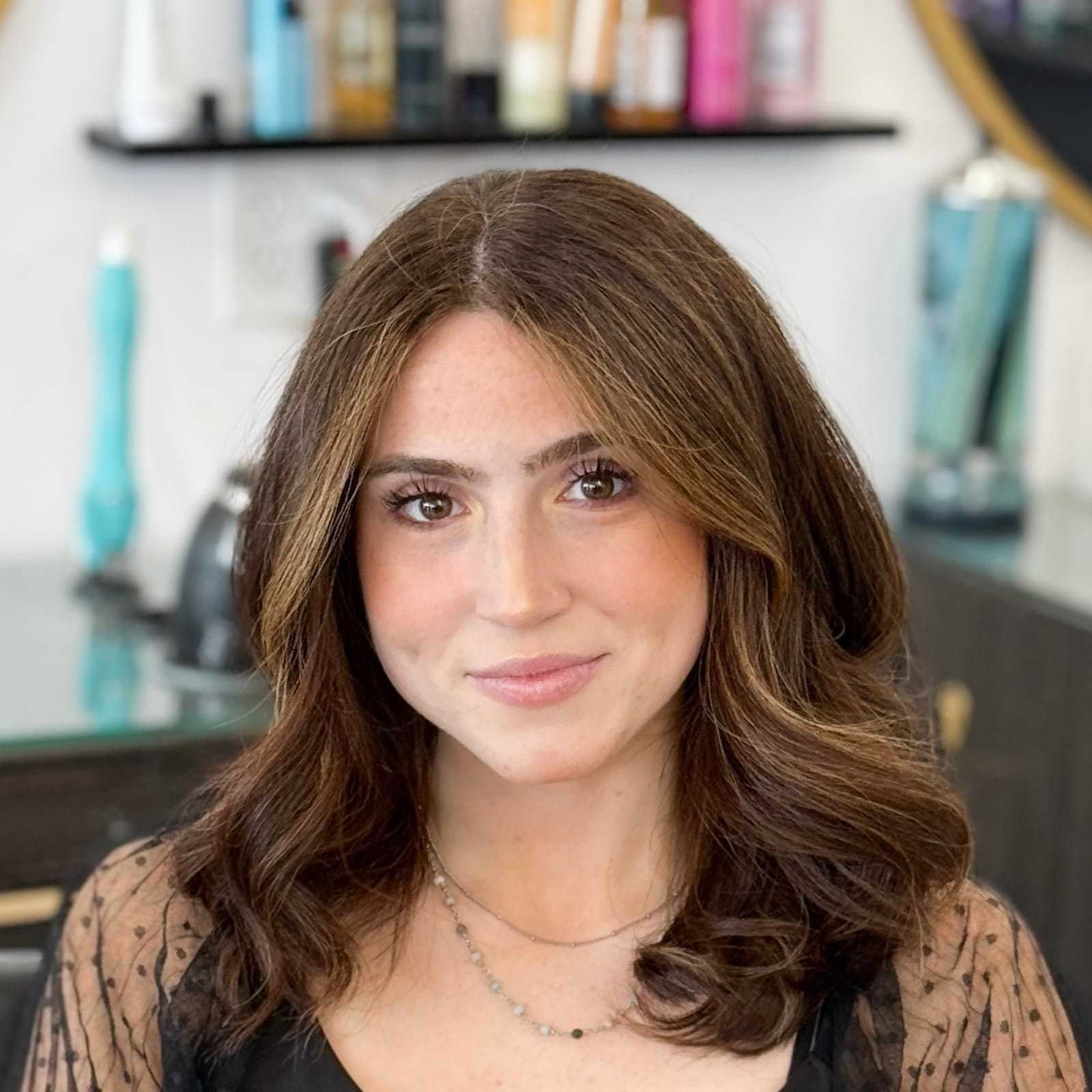 Portrait of Daniella, a professional stylist at Salon Blissful Med Spa, showcasing their expertise and style.