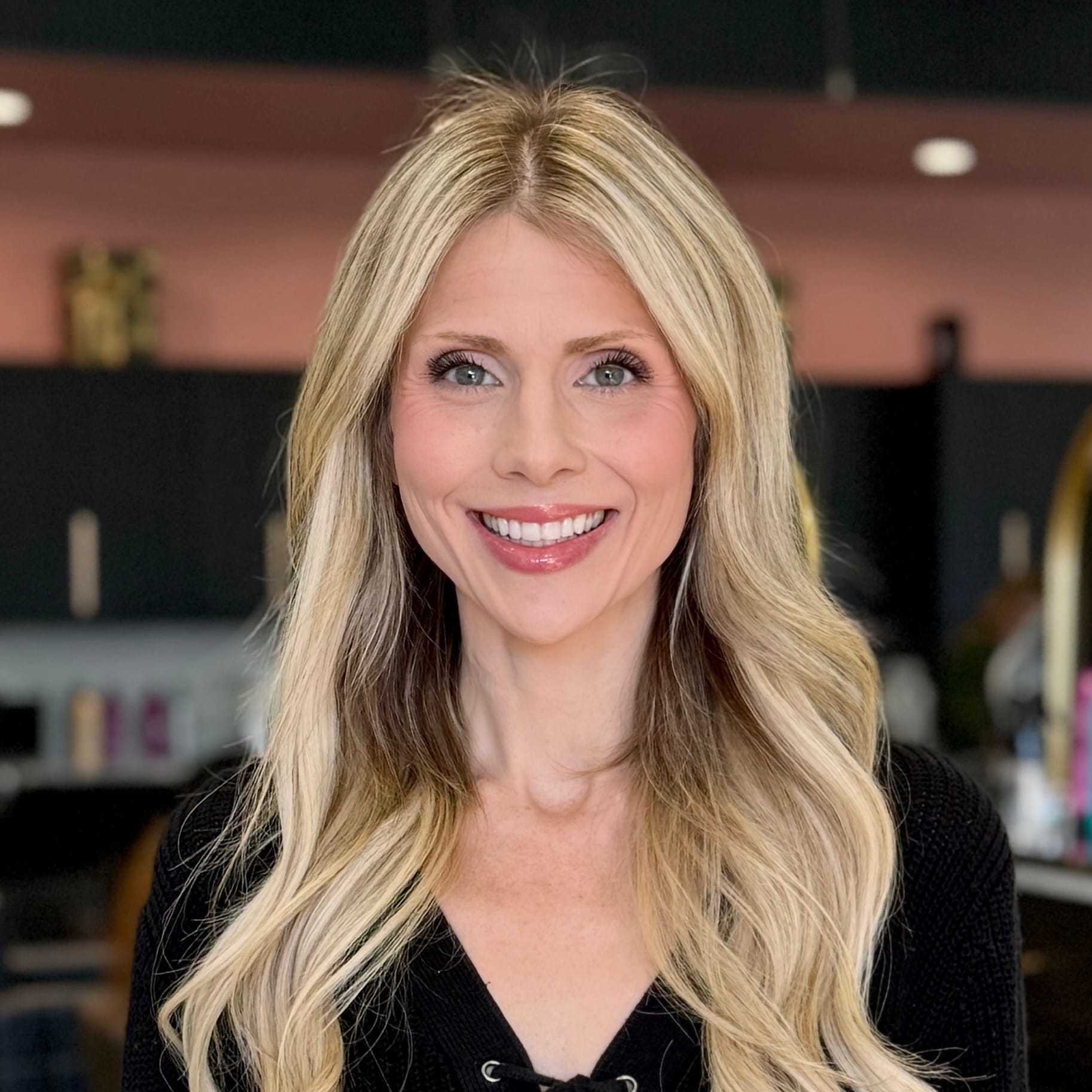 Portrait of Morgan, a professional stylist at Salon Blissful Med Spa, showcasing their expertise and style.