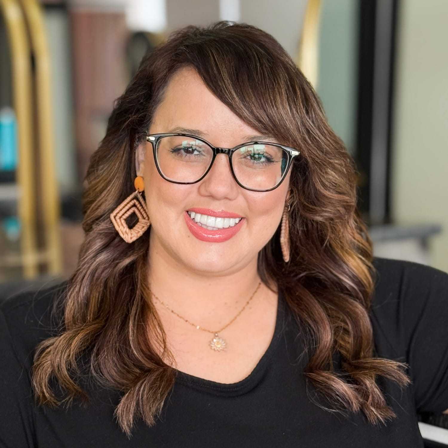 Portrait of Vanessa, a professional stylist at Salon Blissful Med Spa, showcasing their expertise and style.