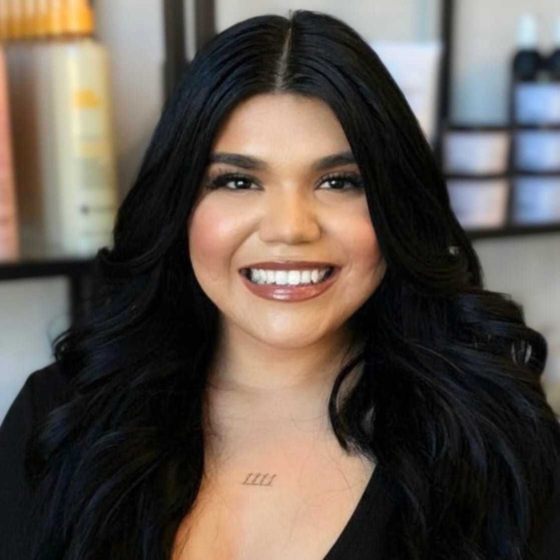 Portrait of Alyssa, a professional stylist at Salon Blissful Med Spa, showcasing their expertise and style.