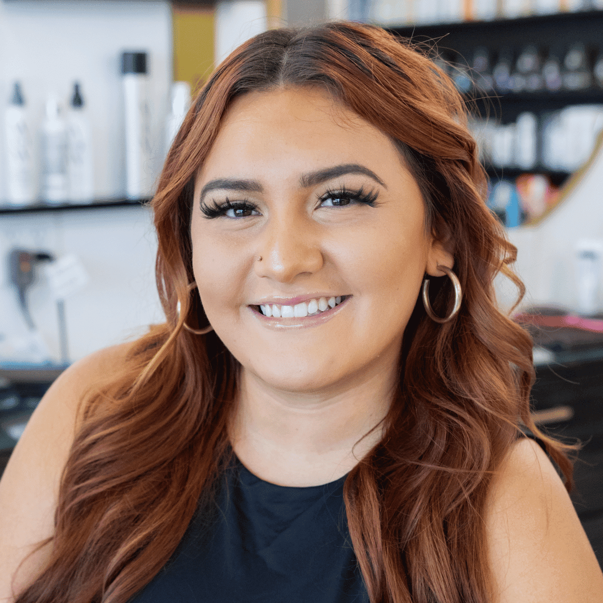 Portrait of Alexa, a professional stylist at Salon Blissful Med Spa, showcasing their expertise and style.